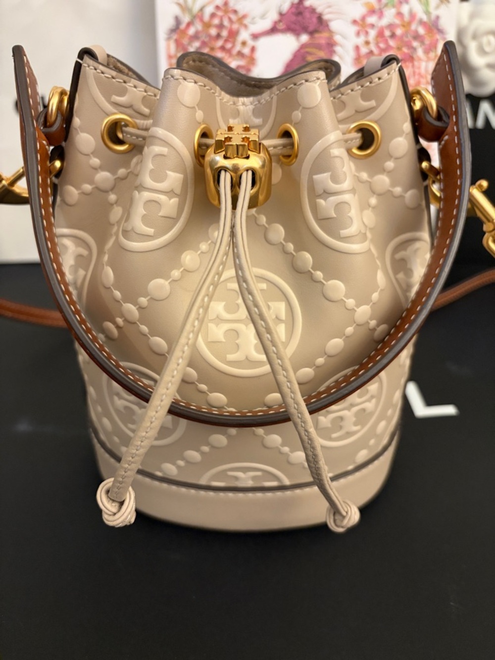 Tory Burch Cream Embossed Logo Mini Drawstring Bucket Bag